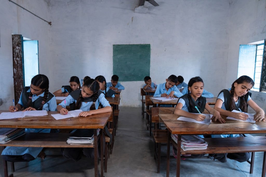 Students studying in government school